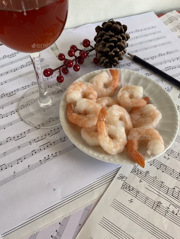 Having wine with shrimp while writing music