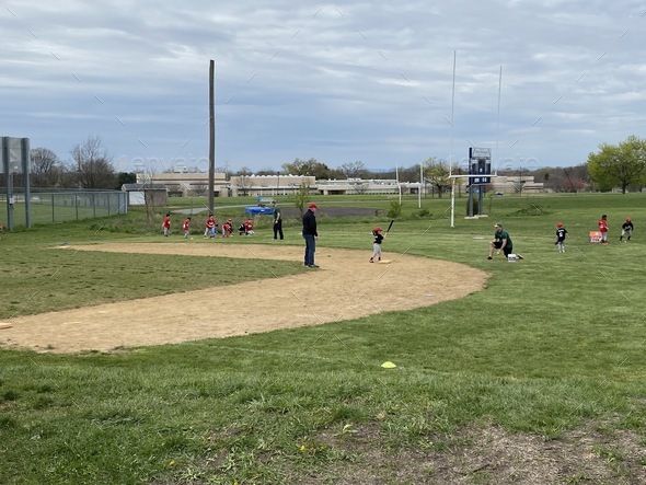 Little league baseball game in the baseball field