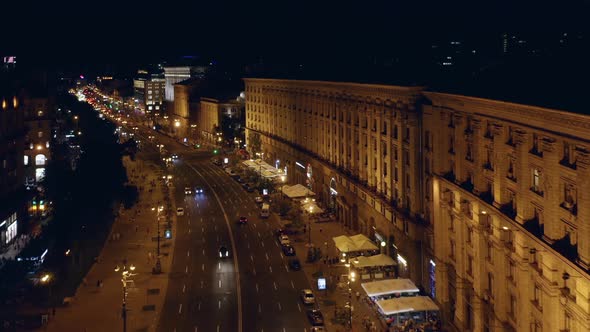 Aerial Top View of Illuminated City Street with Car Traffic alt