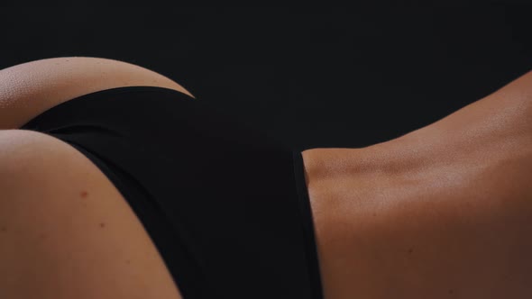 Beautiful Back of an Attractive Woman in Black Panties