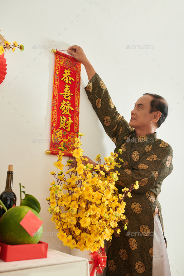 Man Hanging Scroll with Spring Festival Couplets