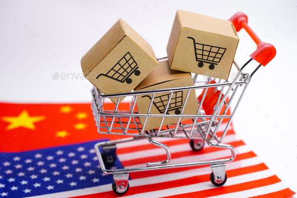 Box with shopping cart logo on USA and china flag. Import Export concept.