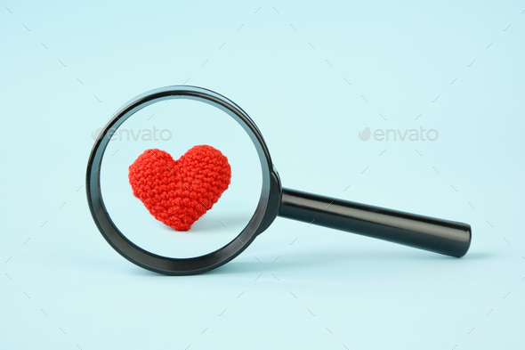 Heart under a magnifying glass. Love, heart examination concept. Stock ...