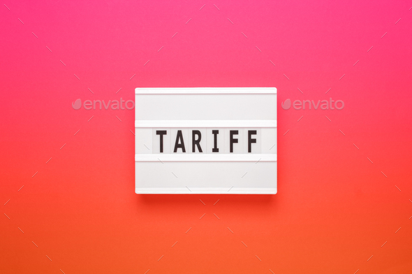 Lightbox with word tariff on pink gradient background. Business concept on white background. Top - Stock Photo - Images