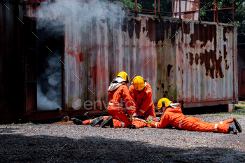 Group firefighters men wearing firefighting suit on safety rescue duty help stop breathing heart att