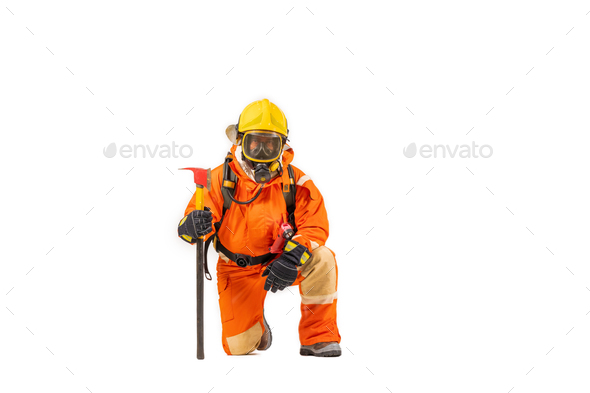 Firefighter man wearing protective fire suite and helmet with equipment and accessories is fire safe