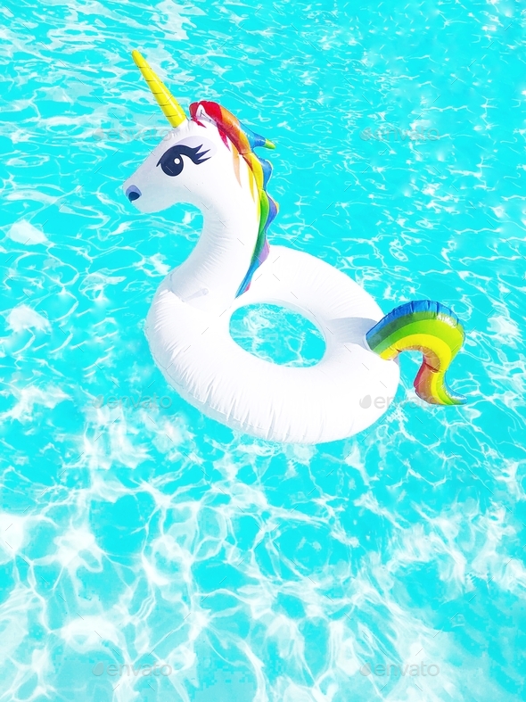 Unicorn pool floatie in swimming pool