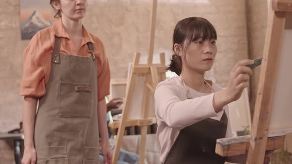 Art Teacher Advising Woman alt