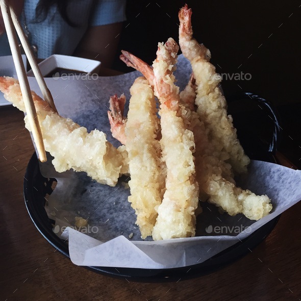 Chopsticks grabbing a shrimp tempura Stock Photo by ozmundaregalis