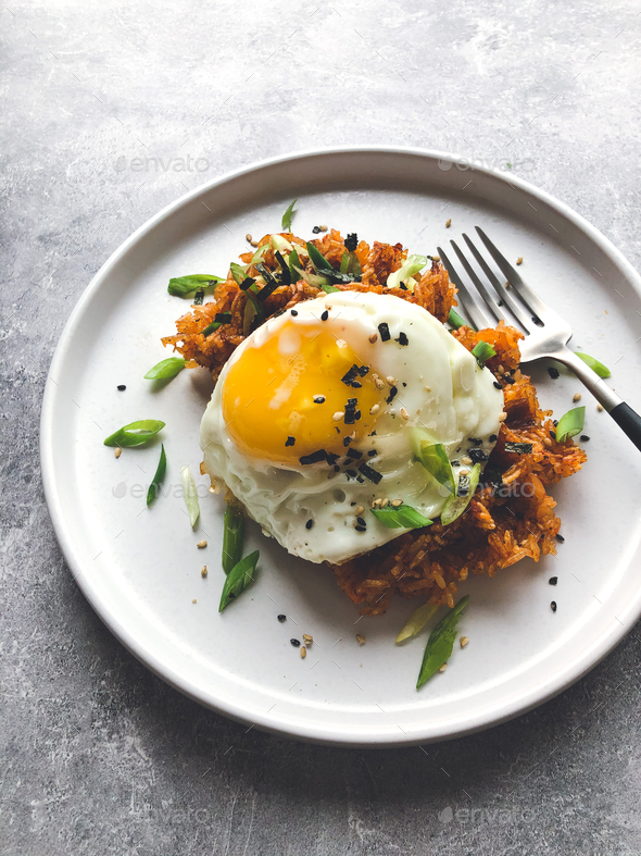 Close up of sun egg with kimchi fried rice waffles