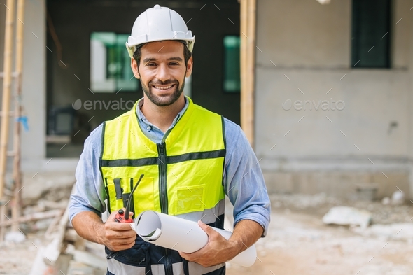 Engineer builder. Happy Foreman work in construction site. senior ...