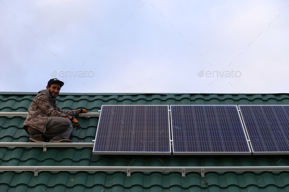 Roof top with solar panels for sun energy, installations of solar panels, builder, ecofriendly