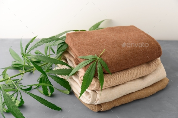 Stack of hemp clothes with leaves