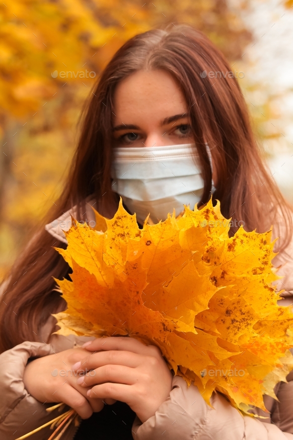 Teenage girl wearing face mask during coronavirus outbreak. Virus spread flu prevention carantine