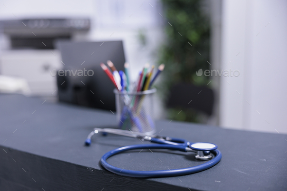 Close up of stethoscope on desk with stationery