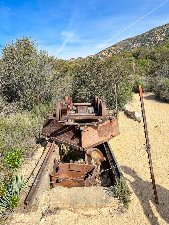 old abandoned train wheels axle at top of a mountain in Pasadena, while