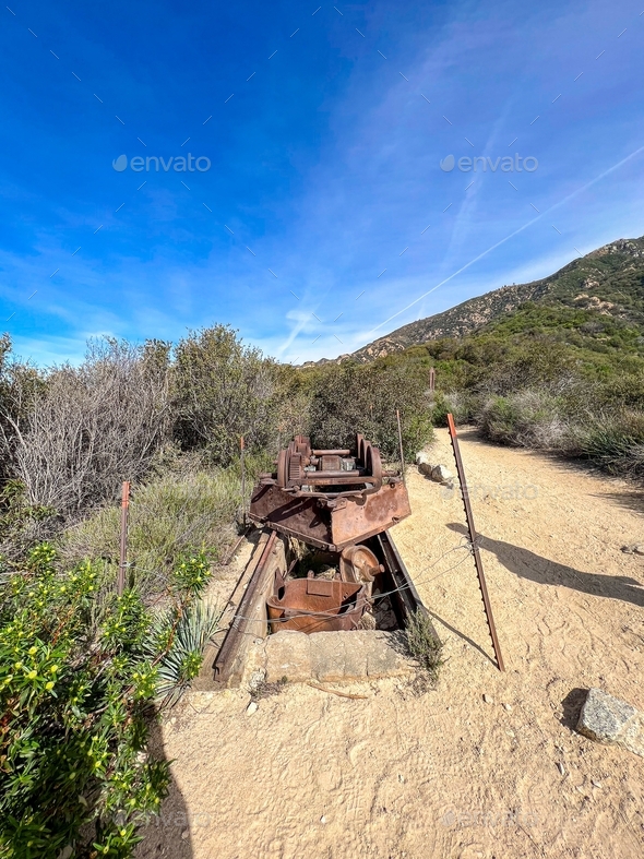 old abandoned train wheels axle at top of a mountain in Pasadena, while