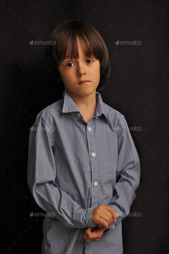 Caucasian preschooler boy 4-5 years old stressed.
