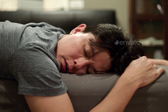 Portrait Asian Drunk Man Sleeping On The Bed Without Showering Lazy