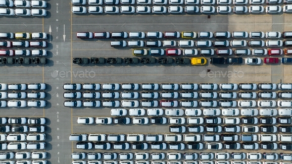 Aerial view a lot of new car for import and export shipping by ship , Smart dealership at car depot,