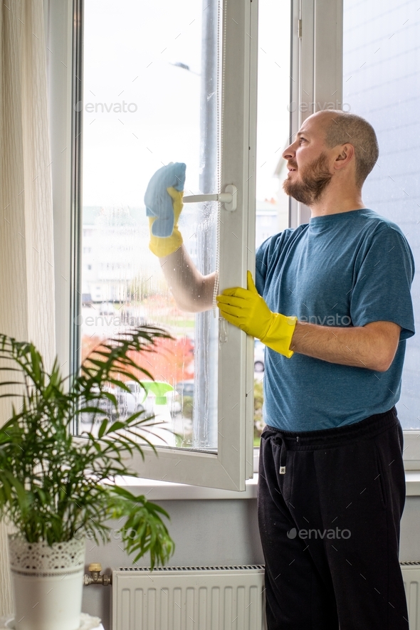 Yellow Rubber Gloves Window Squeegie On Stock Photo 12750907