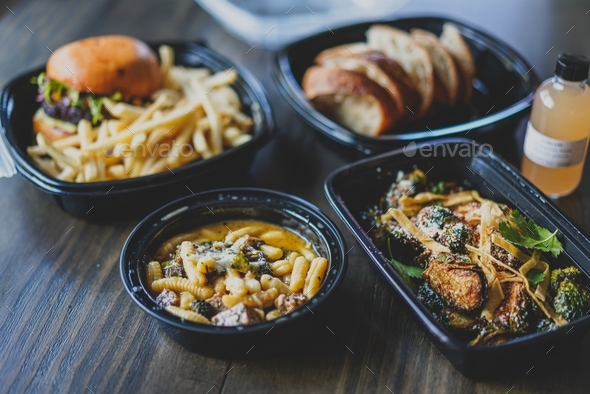 Takeout food and cocktail in containers  - Stock Photo - Images