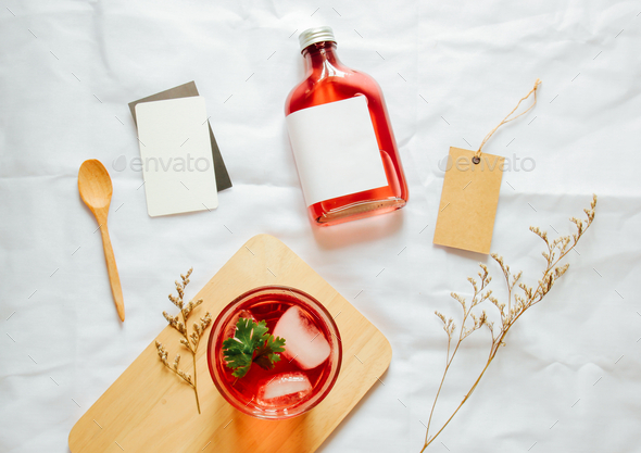 Cold brew tea branding mockup set with glass of iced tea and tag card