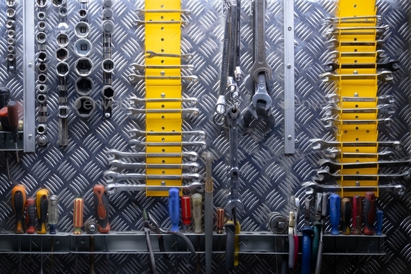 Tool organization. Stand with tools. Workshop. Garage tools. Order in the workplace.