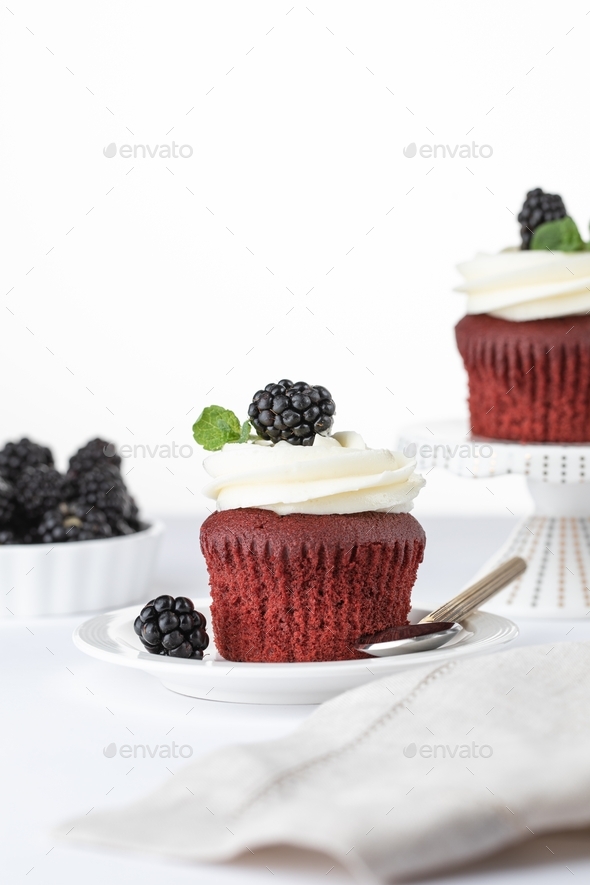 Velvet cupcakes with blackberries - Stock Photo - Images
