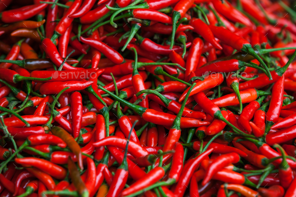 Red chilli peppers at the market stall, Sapa, Vietnam - Stock Photo - Images