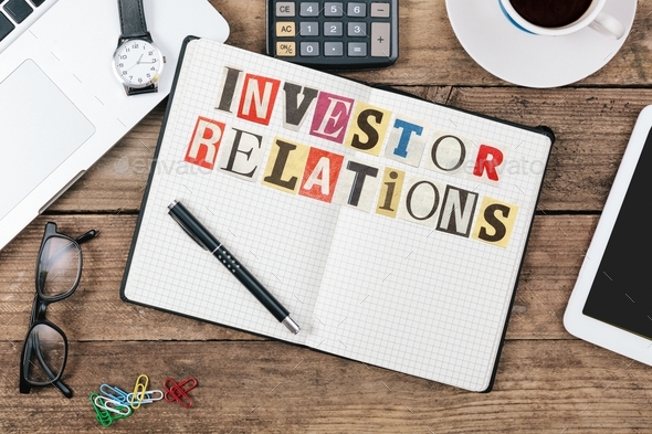 Investor Relations title on paper notebook at corporate office desk - Stock Photo - Images