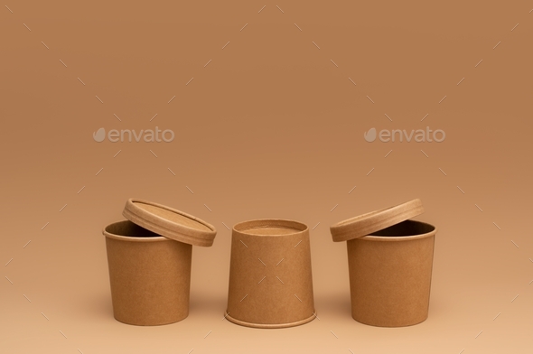 Brown Craft paper Disposable soup cups on beige background.