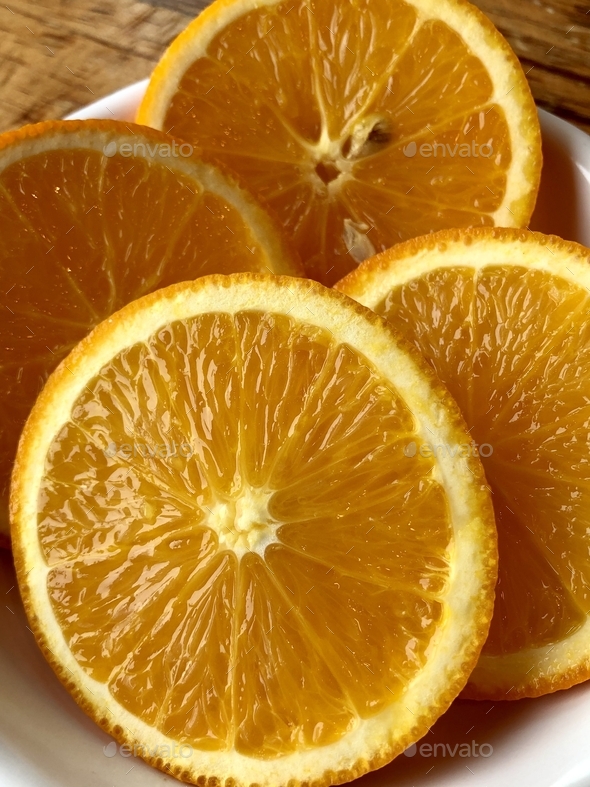 Cold sliced oranges for lunch dessert for good health. Texture of pulp