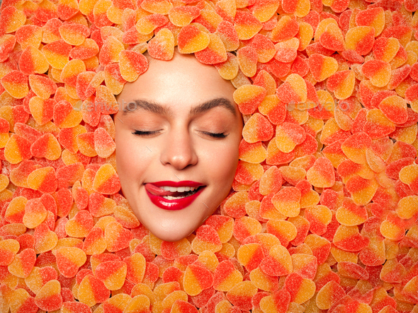 Delighted model posing in fruit jelly Stock Photo by kegfire | PhotoDune