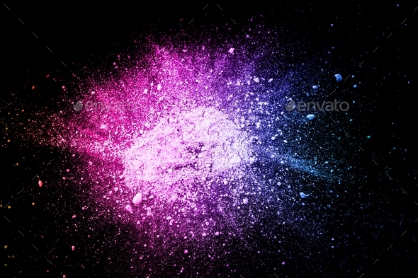Pile of natural colored pigment powder. Blue Pink powder particles splatter on black blackground.