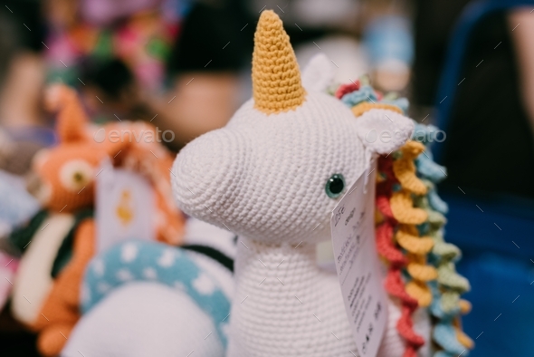 Crocheted unicorn. Handmade toy. Plush toy. Market. Crocheted toy animal.