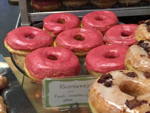 Raspberry Doughnuts at Glazed Gourmet Doughnuts in Charleston SC - Stock Photo - Images