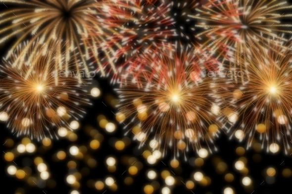 Fireworks holiday background for new year greetings , blurry bokeh effect of fireworks