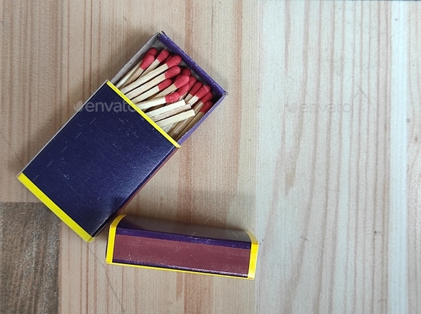 Close up of a matchbox with matchstick, wooden matches box