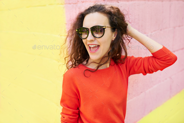 Pop girl portrait wearing bright vibrant clothes - Stock Photo - Images