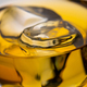 Glass of whisky with ice cubes, close-up shot - PhotoDune Item for Sale