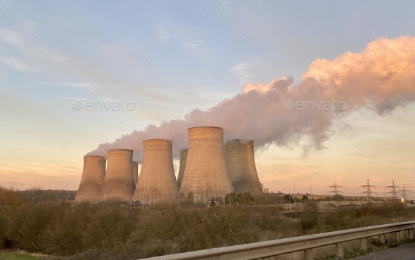 Power station chimneys belching steam, environmental impact, fossil fuel