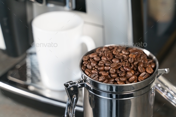 preparing coffee with milk in a modern coffee machine