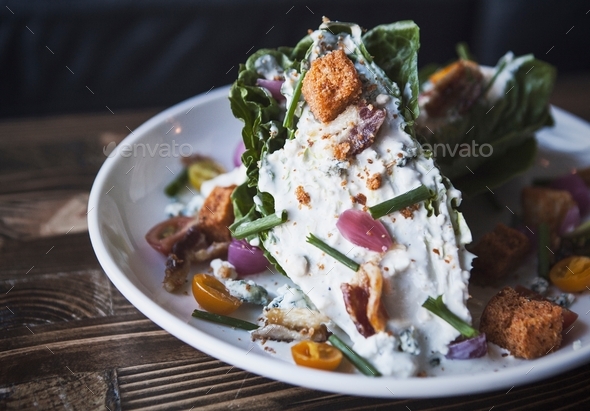 Close up shot of a wedge salad.  - Stock Photo - Images