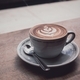 A cappuccino on a windowsill in a coffee shop.  - PhotoDune Item for Sale