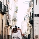 Gay Couple walking on the streets of Lisbon.  - PhotoDune Item for Sale