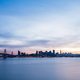 San Francisco skyline at sunset with a silhouette of skyscrapers and the Bay Bridge with dramatic - PhotoDune Item for Sale