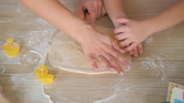 Close Up of Cutting Easter Cookies From a Dough alt