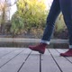 Female Legs in Burgundy Boots and Blue Jeans Climb the Stone Stairs - VideoHive Item for Sale