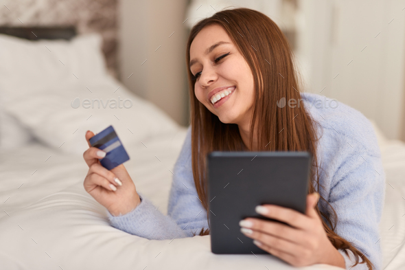 Smiling woman shopping from home